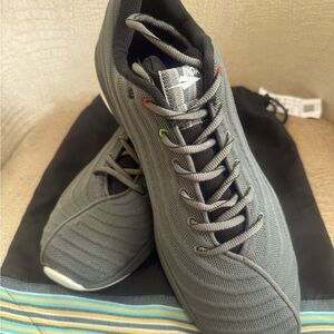 NWT. Men’s lightweight running sneakers inspired by Kenyan athletes. Size 14.